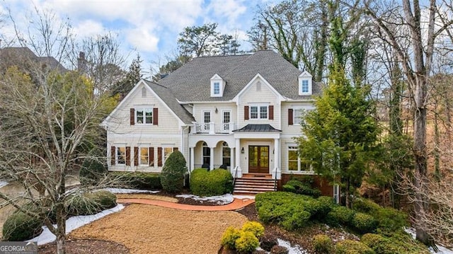 view of front of home with a balcony