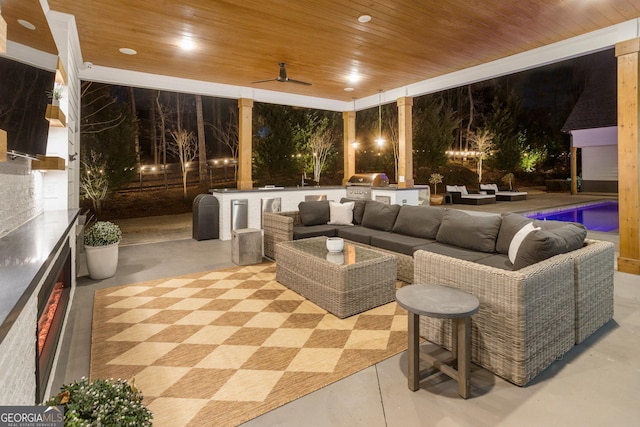 view of patio / terrace featuring ceiling fan, area for grilling, a grill, and outdoor lounge area