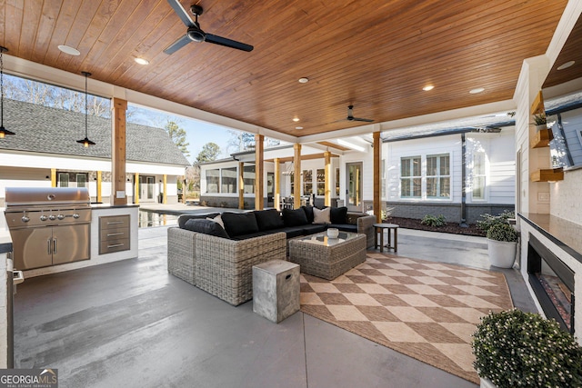 view of patio featuring area for grilling, an outdoor living space, grilling area, and ceiling fan