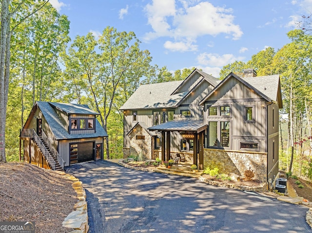 view of front of house featuring a garage and covered porch