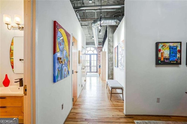 hallway featuring wood finished floors