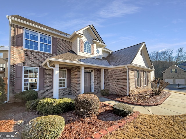 view of front of property featuring a garage