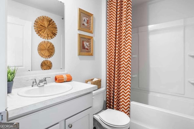 full bathroom featuring vanity, toilet, and shower / bath combo