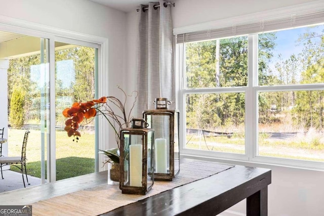 sunroom / solarium featuring a wealth of natural light