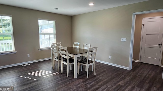 214 Harris St, Chatsworth, GA 30705 - dining room featuring baseboards and dark wood-style flooring