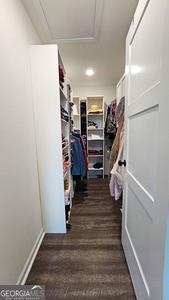 214 Harris St, Chatsworth, GA 30705 - spacious closet with attic access and wood finished floors