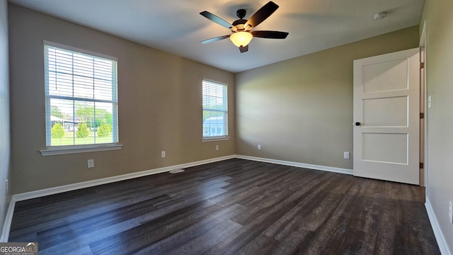 214 Harris St, Chatsworth, GA 30705 - unfurnished room featuring plenty of natural light, baseboards, dark wood-style flooring, and a ceiling fan