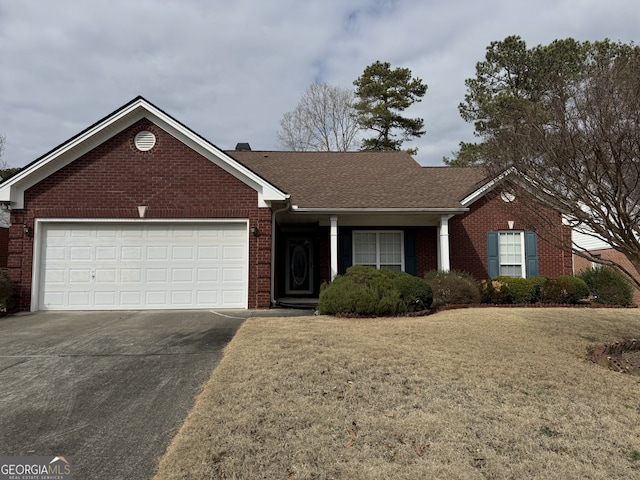 single story home with a garage and a front yard