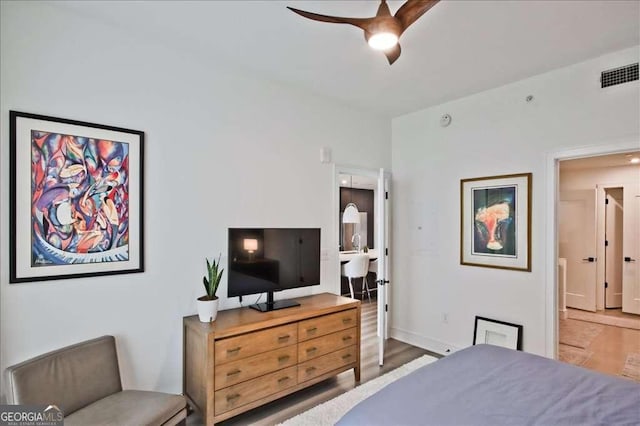 bedroom featuring hardwood / wood-style floors