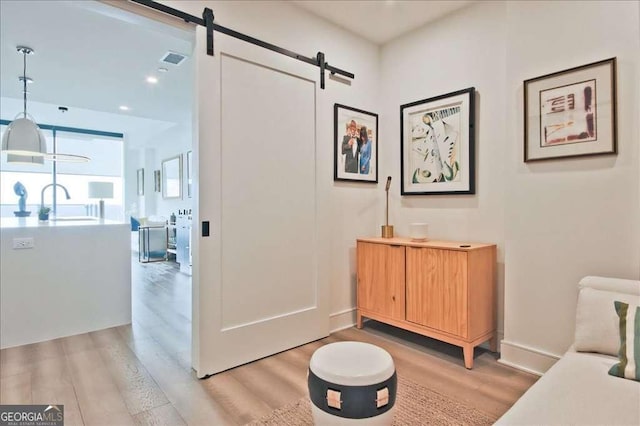 interior space featuring hardwood / wood-style flooring and sink