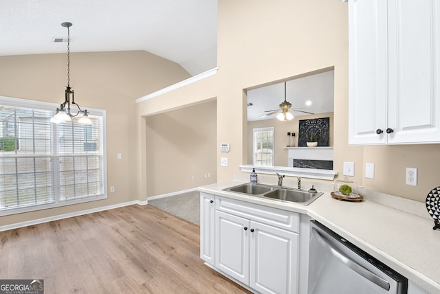 kitchen with white cabinetry, dishwasher, sink, and pendant lighting