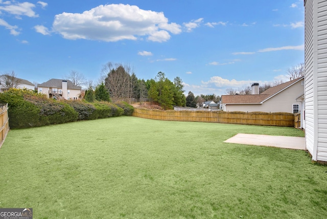 view of yard with a patio area