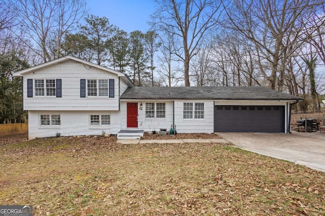 split level home featuring a garage