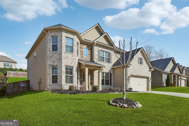 view of front of home with brick siding, concrete driveway, a front lawn, and fence