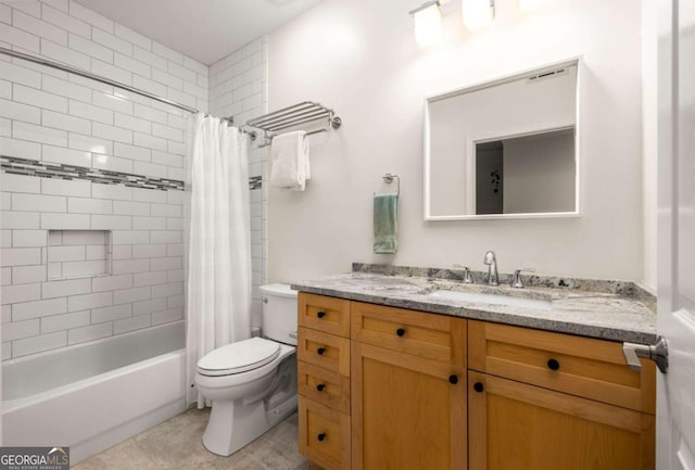 full bathroom featuring vanity, tile patterned flooring, toilet, and shower / bath combo with shower curtain