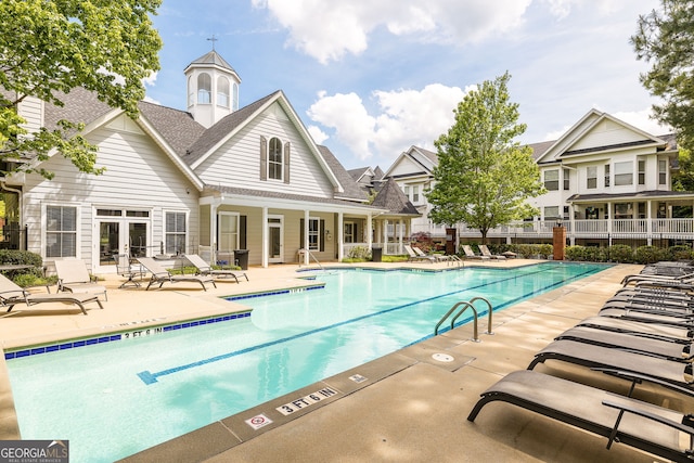 view of pool featuring a patio area