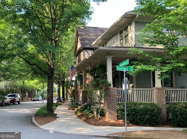 view of home's exterior with a porch