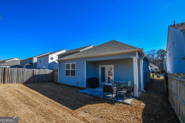 back of property featuring a patio area