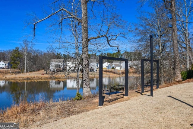 exterior space with a water view