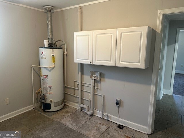 utility room featuring water heater