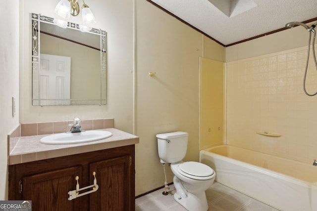 full bathroom featuring vanity, ornamental molding, a textured ceiling, shower / washtub combination, and toilet