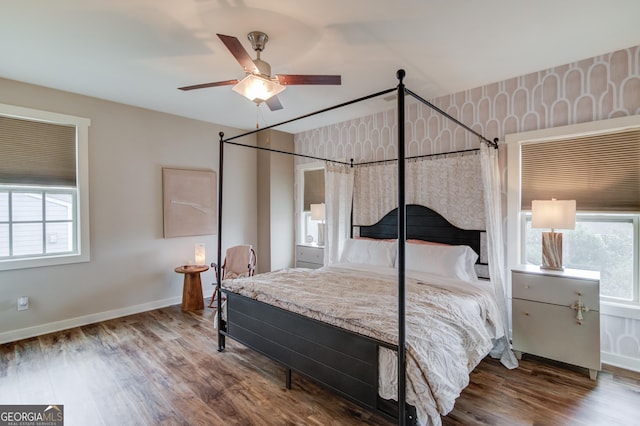 bedroom featuring wood-type flooring and ceiling fan