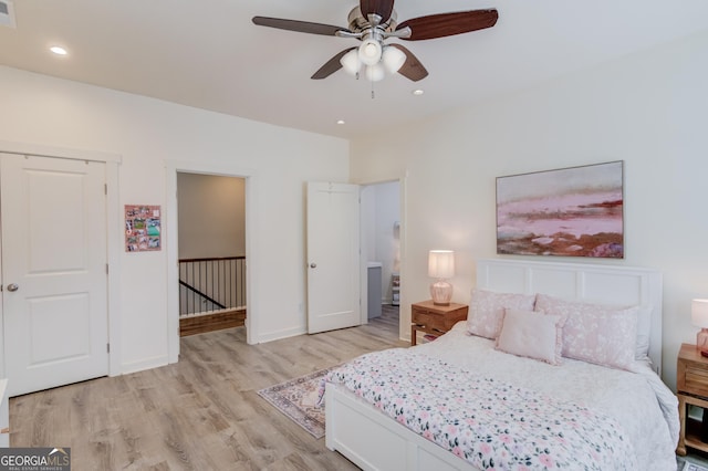 bedroom featuring ceiling fan and light wood-type flooring