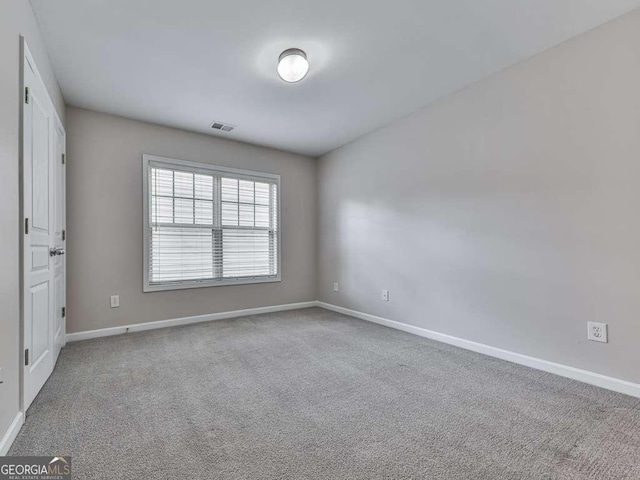 view of carpeted spare room