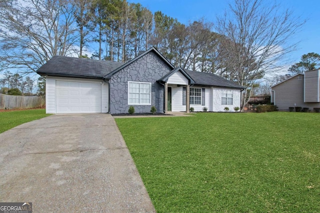 single story home with a garage and a front yard