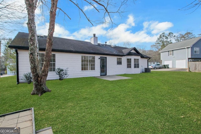 rear view of property with a patio area, a lawn, and central air condition unit