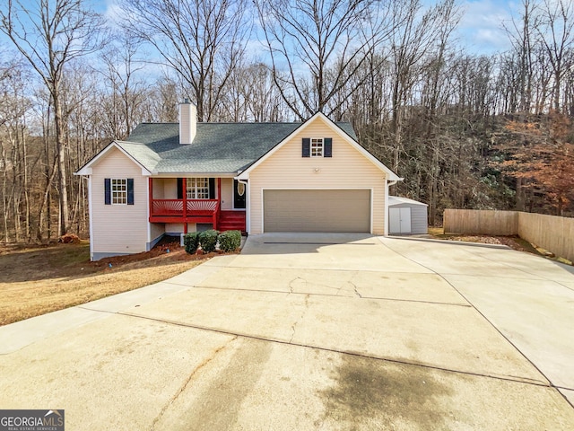 view of front of house with an outbuilding and a porch