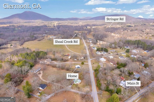 aerial view featuring a mountain view