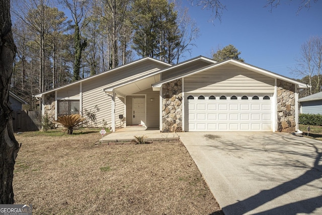 ranch-style home featuring a garage