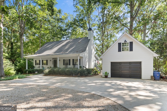 view of front of home with a garage and covered porch