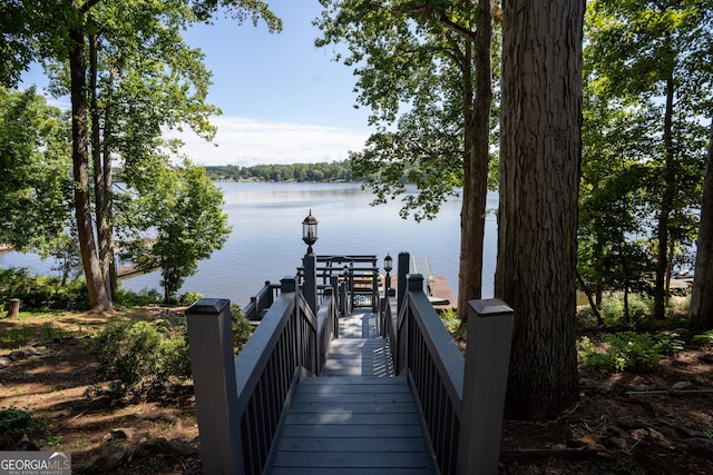 dock area featuring a water view