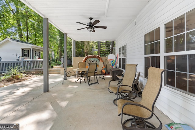 view of patio with ceiling fan