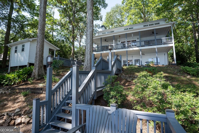 back of house featuring ceiling fan