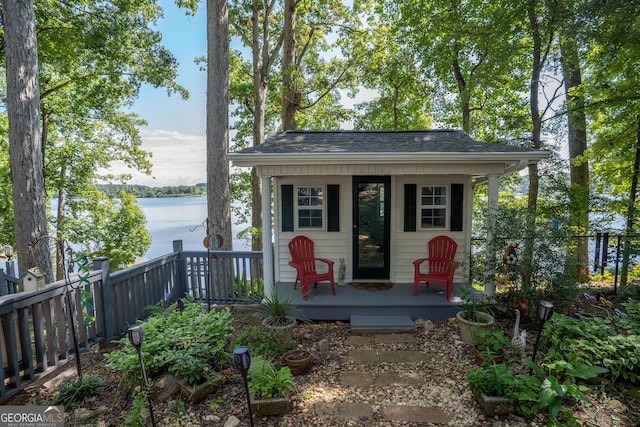 view of outbuilding featuring a water view