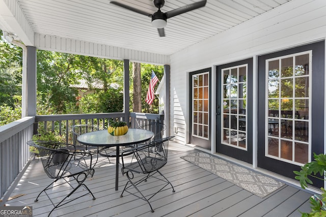 wooden terrace with ceiling fan