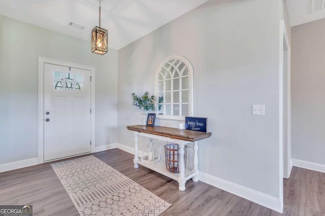 entrance foyer featuring hardwood / wood-style flooring