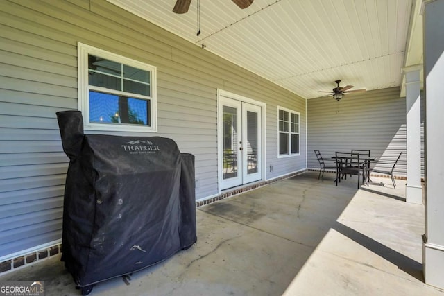 view of patio / terrace featuring french doors, ceiling fan, and a grill