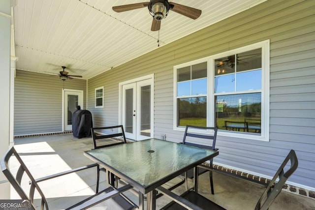 view of patio with french doors and ceiling fan