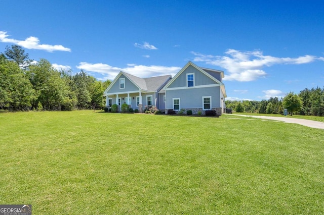 view of front of home featuring a front lawn and a porch