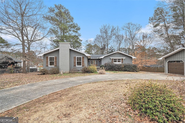 ranch-style home with a garage