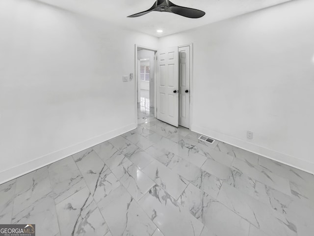 empty room with ceiling fan