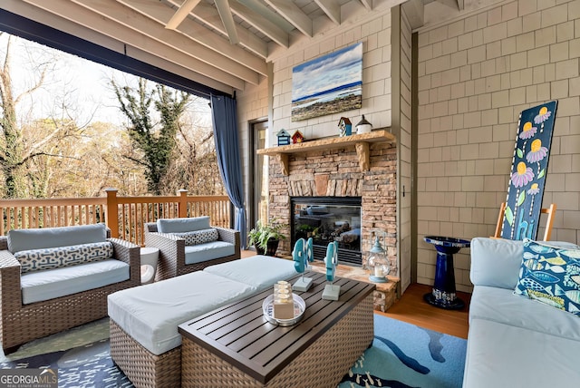 interior space featuring an outdoor living space with a fireplace