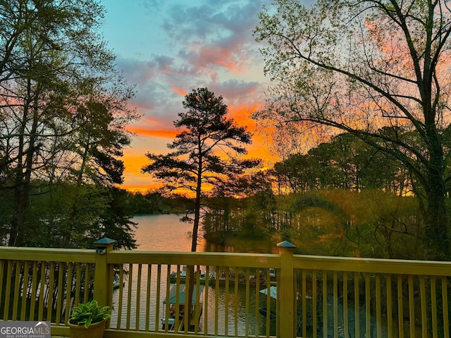 deck at dusk with a water view