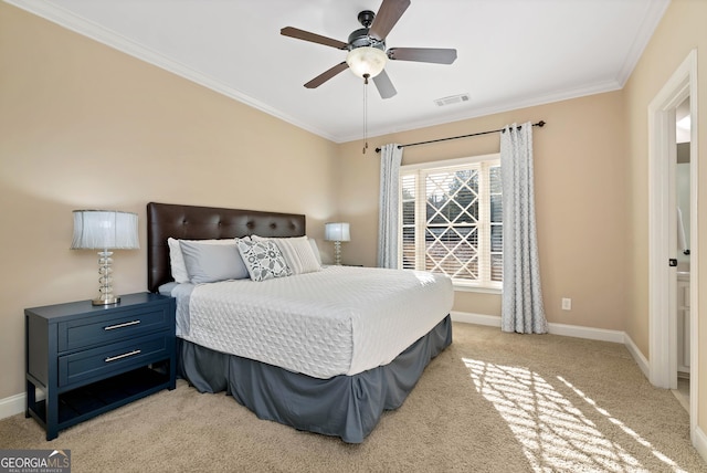 carpeted bedroom with crown molding and ceiling fan