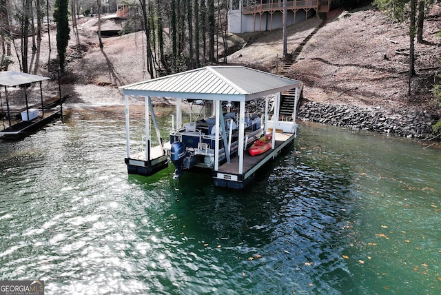 dock area featuring a water view