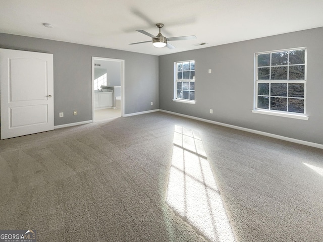 interior space featuring ceiling fan